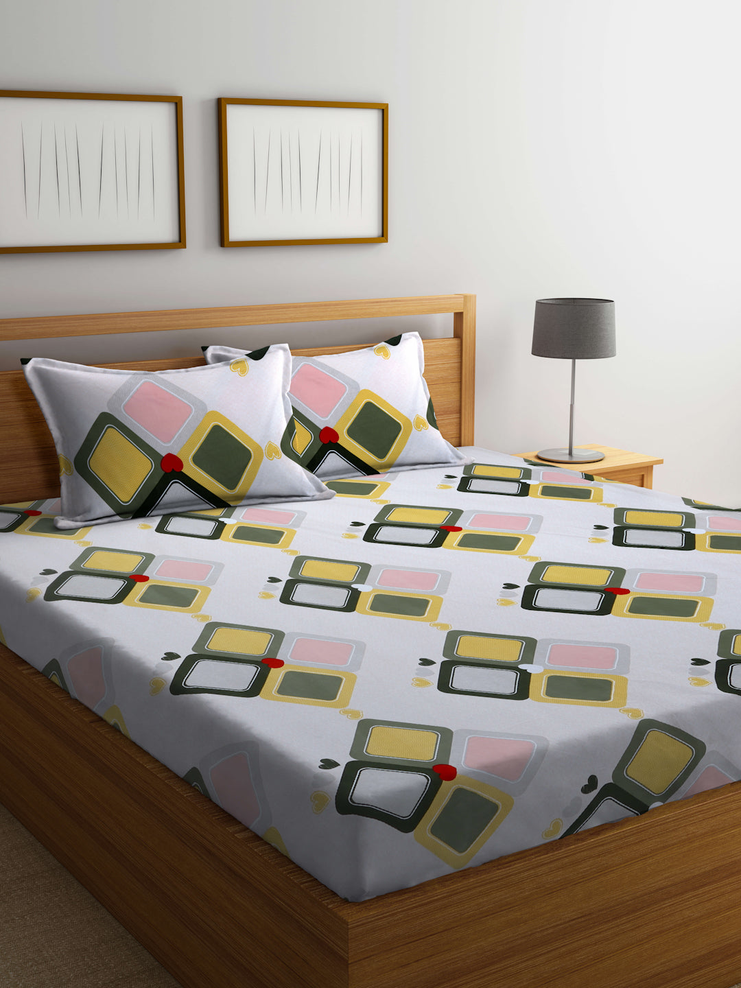 Arrabi Peach Geometric TC Cotton Blend Super King Size Bedsheet with 2 Pillow Covers (270 X 260 cm)
