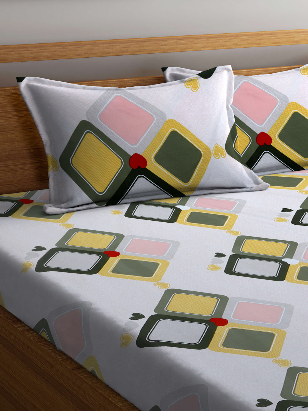 Arrabi Peach Geometric TC Cotton Blend Super King Size Bedsheet with 2 Pillow Covers (270 X 260 cm)